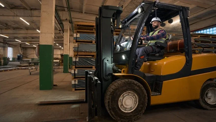 Picking the Perfect Forklift Attachment: Clamps, Booms, Jibs and When to Use Them